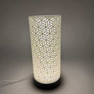 Alternative view of Premium 'Dia' table lamp with geometrically cut cylinder shade and sleek base - Modern mood lighting